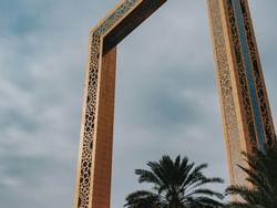 Exterior view of Dubai Frame near Carlton Dubai Creek Hotel