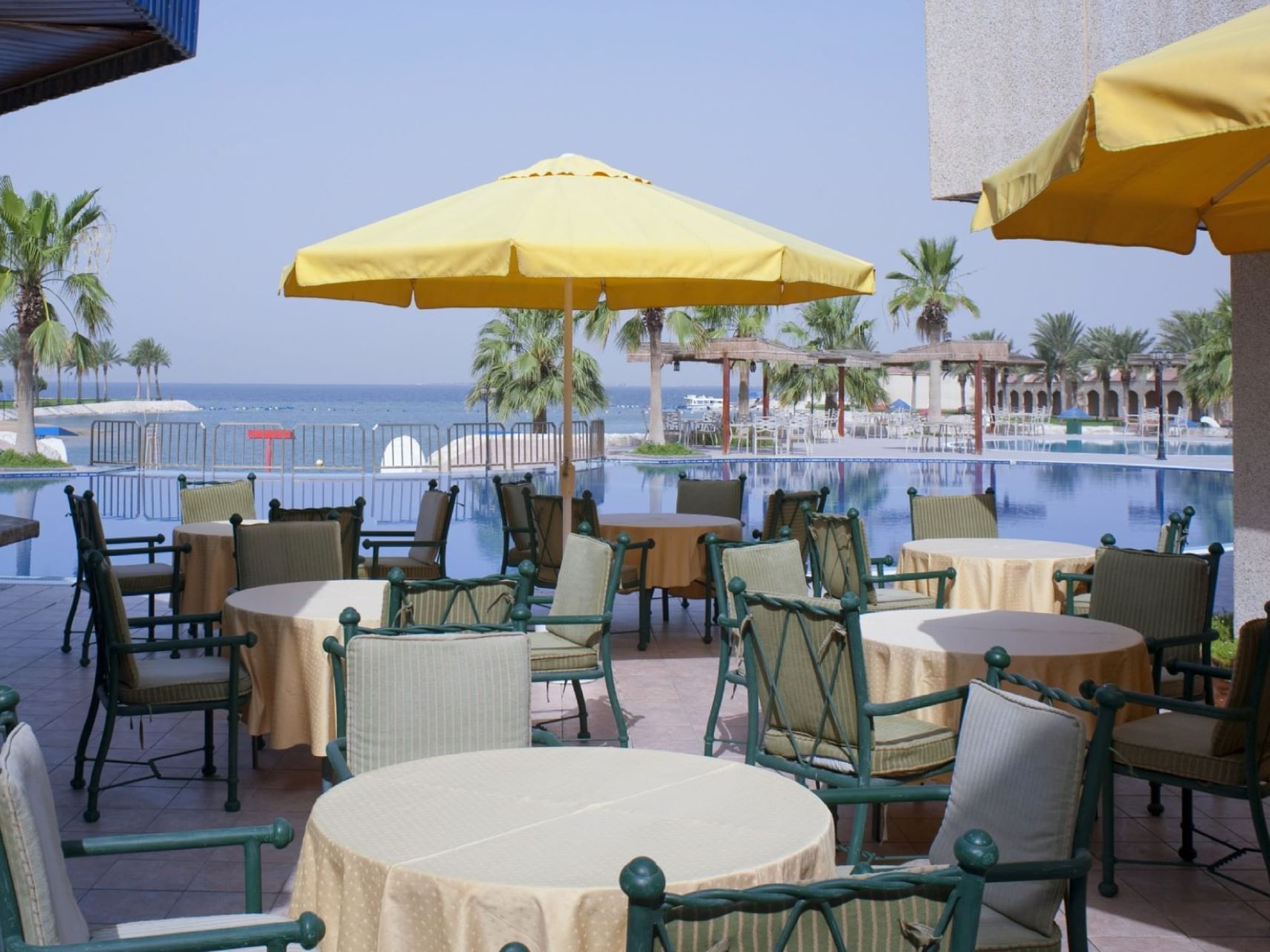 Outdoor dining at Mena Holiday Beach Resort Half Moon Bay
