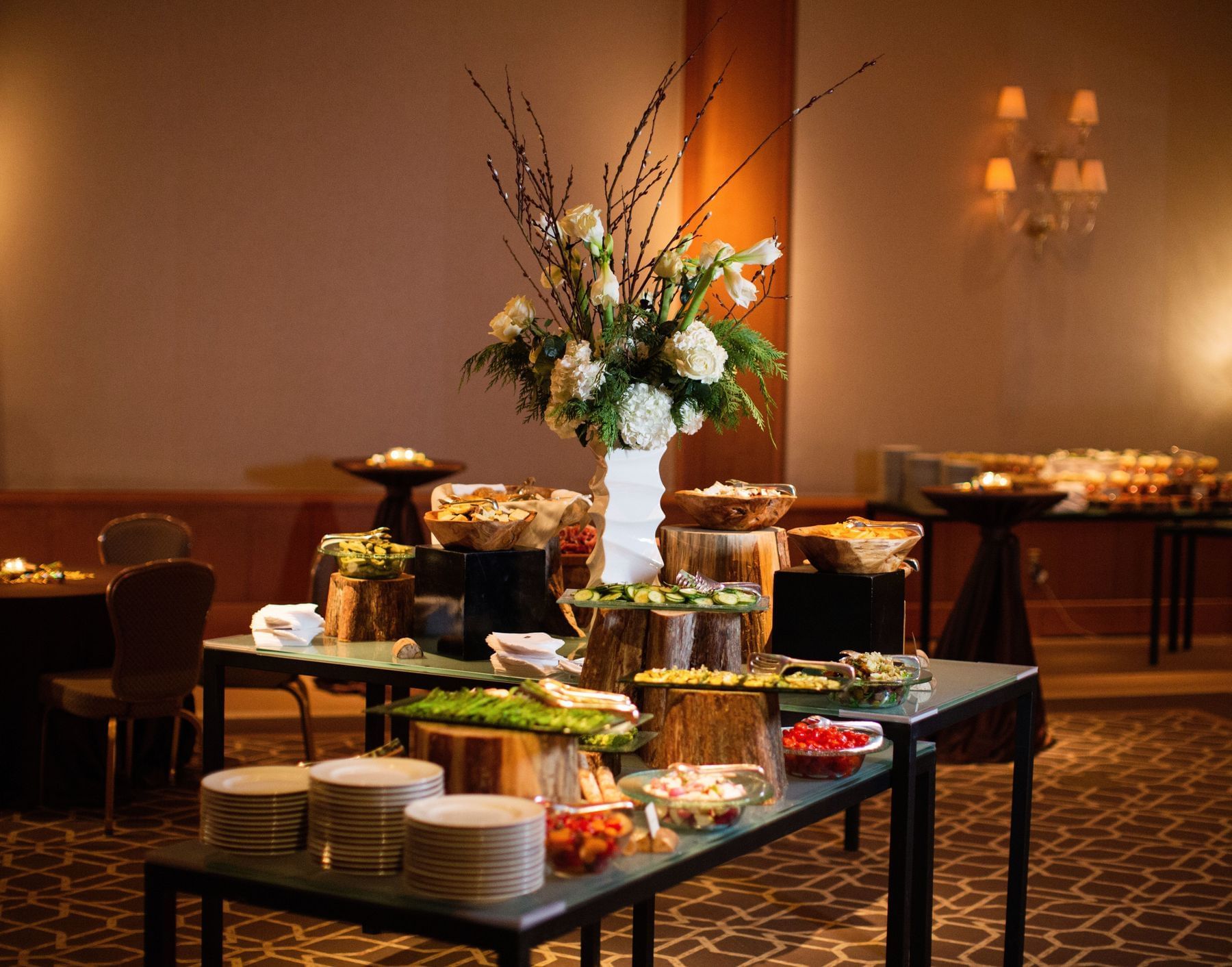 Buffet table with a variety of food dishes at Umstead Hotel and Spa