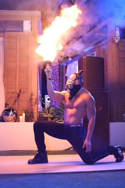 Performer doing a Fire dance, The Morgan Resort Spa Village