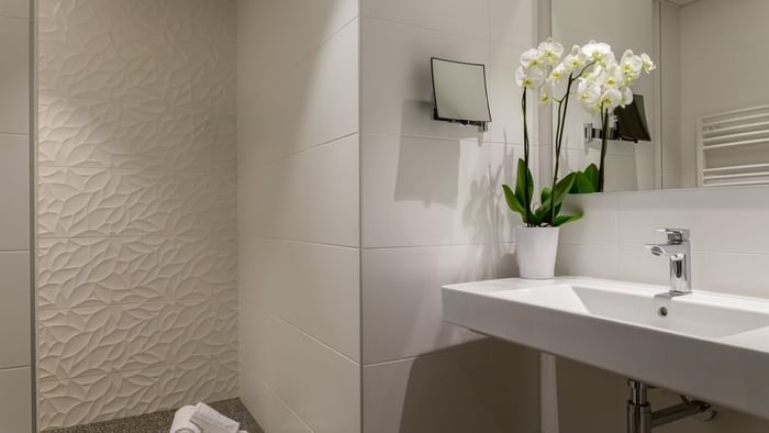 Bathroom vanity in bedrooms at Hotel Armony