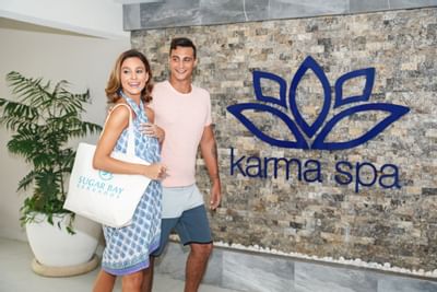 A couple at the entrance of Karma Spa at Sugar Bay Barbados