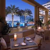 Outdoor dining area in Enigma restaurant at Palazzo Versace
