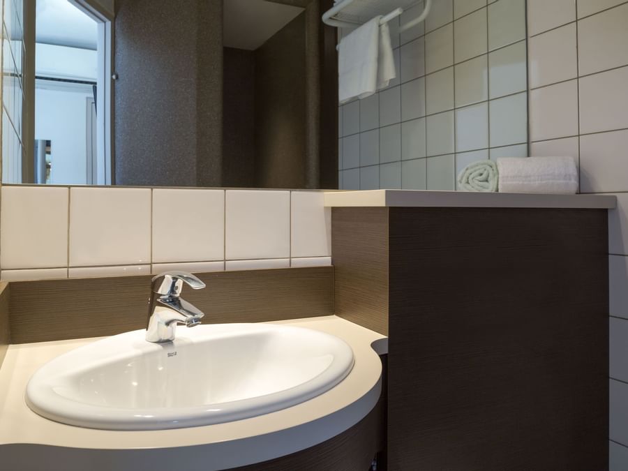 Bathroom vanity in bedrooms at Hotel Helios