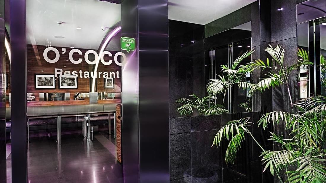 O'cocco Restaurant entrance with plant at Warwick Stone 55 - Beirut