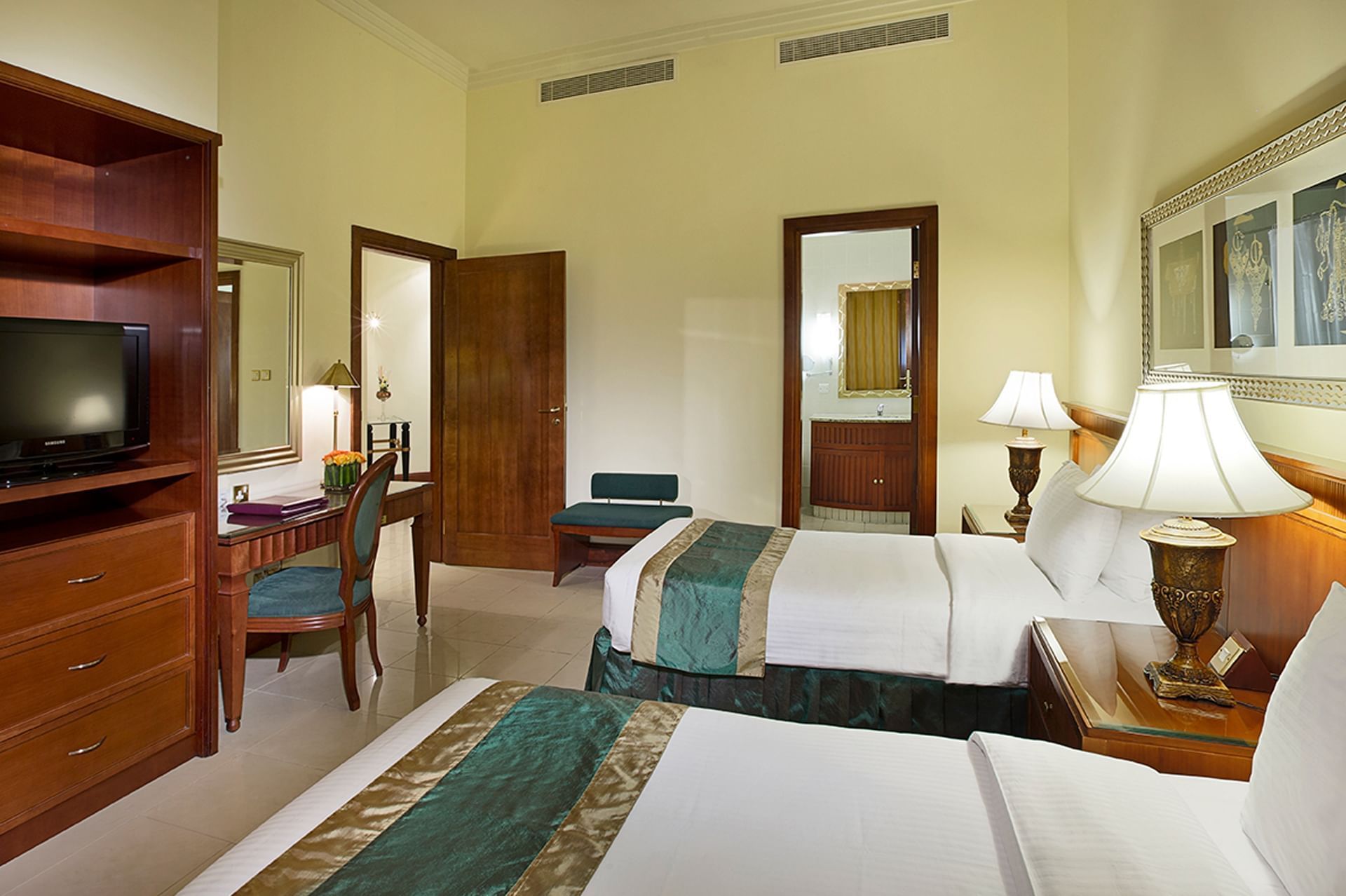 Twin beds in Executive One Bedroom Apartments at City Seasons