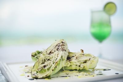 Salad served in a restaurant at Windsong Resort On The Reef