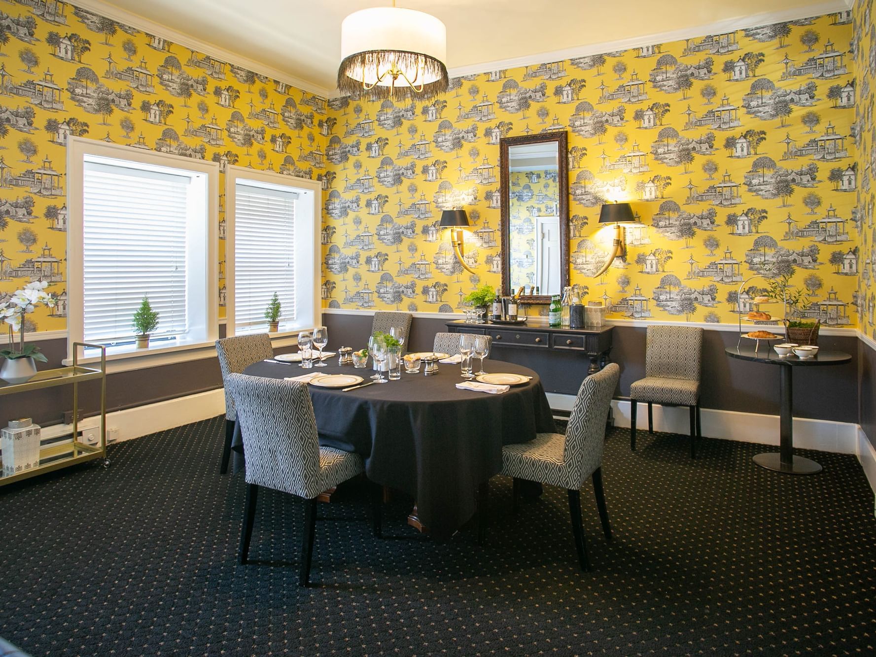 Interior of Ravello Room with banquet tables at Hotel Sorrento