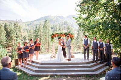 Bride & groom in an outdoor wedding ceremony at Sleeping Lady