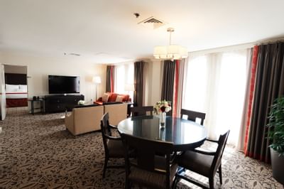dining room with tables and carpet