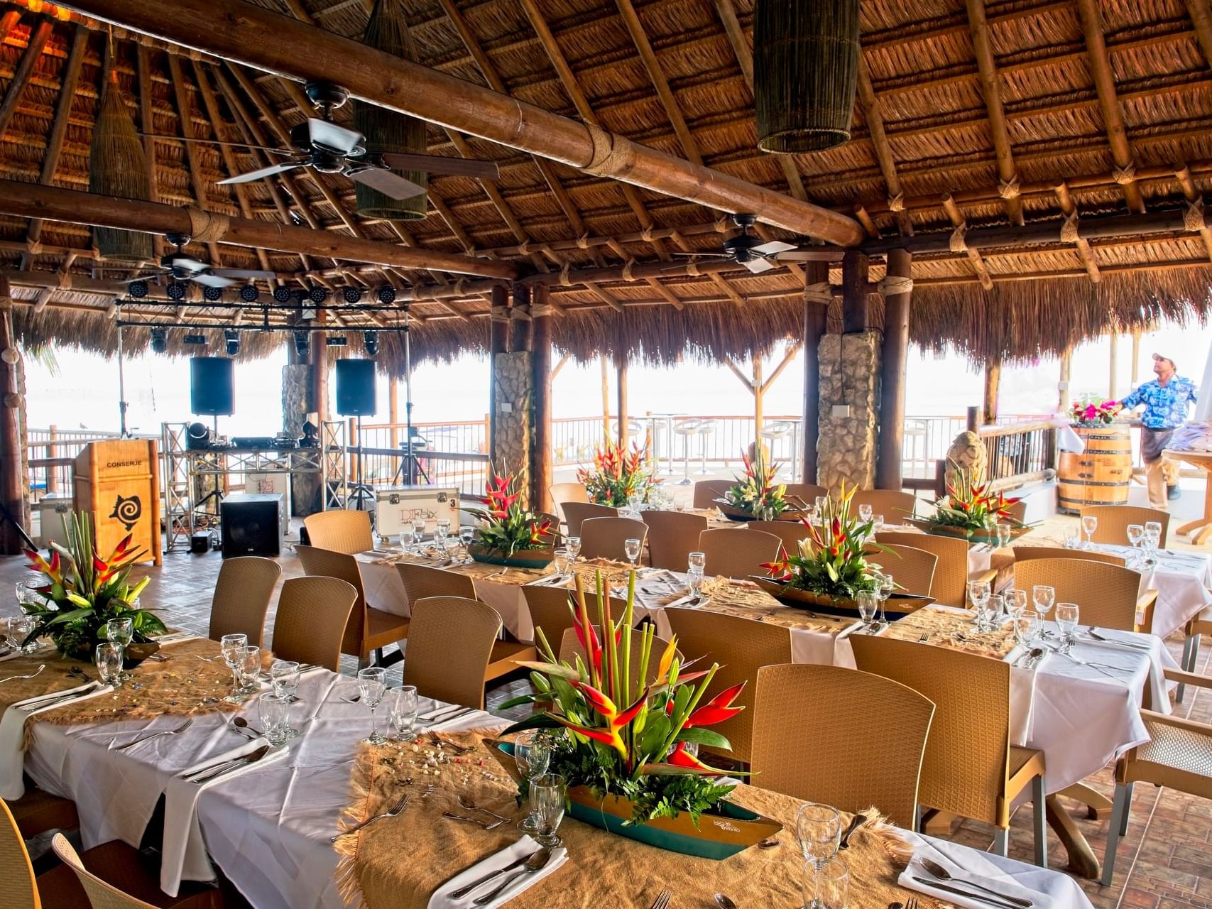 The wedding reception area arranged tables and chairs for guests in Don Juancho at Hotel Isla Del Encanto