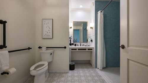 Bathroom interior with patterned floors in Golf View Queen Room at Camp Creek Inn