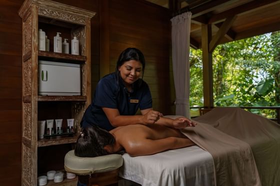 Lady having Deep Tissue Massage, Lotus Spa, Playa Cativo Lodge