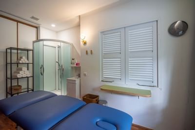 Blue treatment bed in the modern spa at Amara Sanctuary Resort