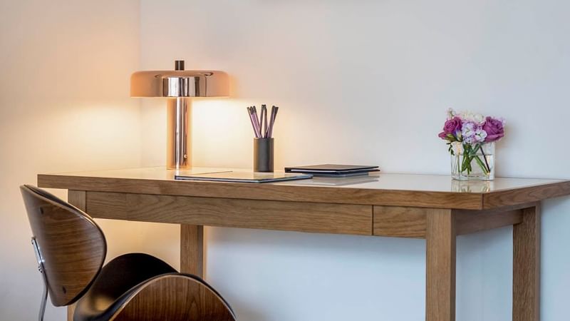 Working table with table lamp in Premier Suite at Warwick Denver