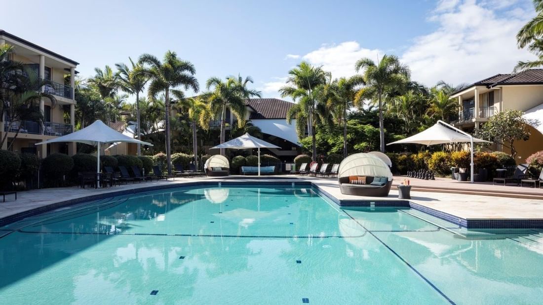 Oasis Pool with patio umbrellas at Mercure Gold Coast Resort
