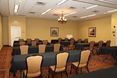 Classroom-type chair arrangement in a meeting room with carpet floors at The Wildwood Hotel
