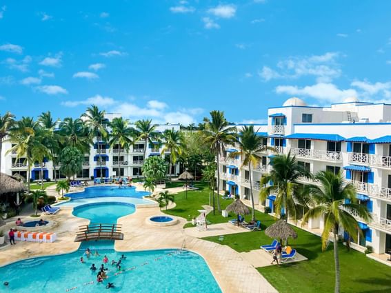 Hotel exterior & saltwater pool at Playa Blanca Beach Resort