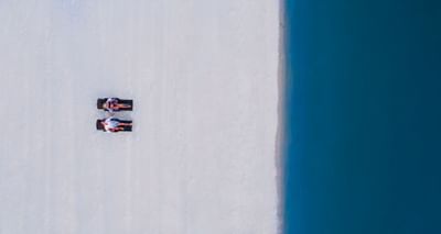 Aerial view of a couple on sunbeds on beach at The Danna Langkawi