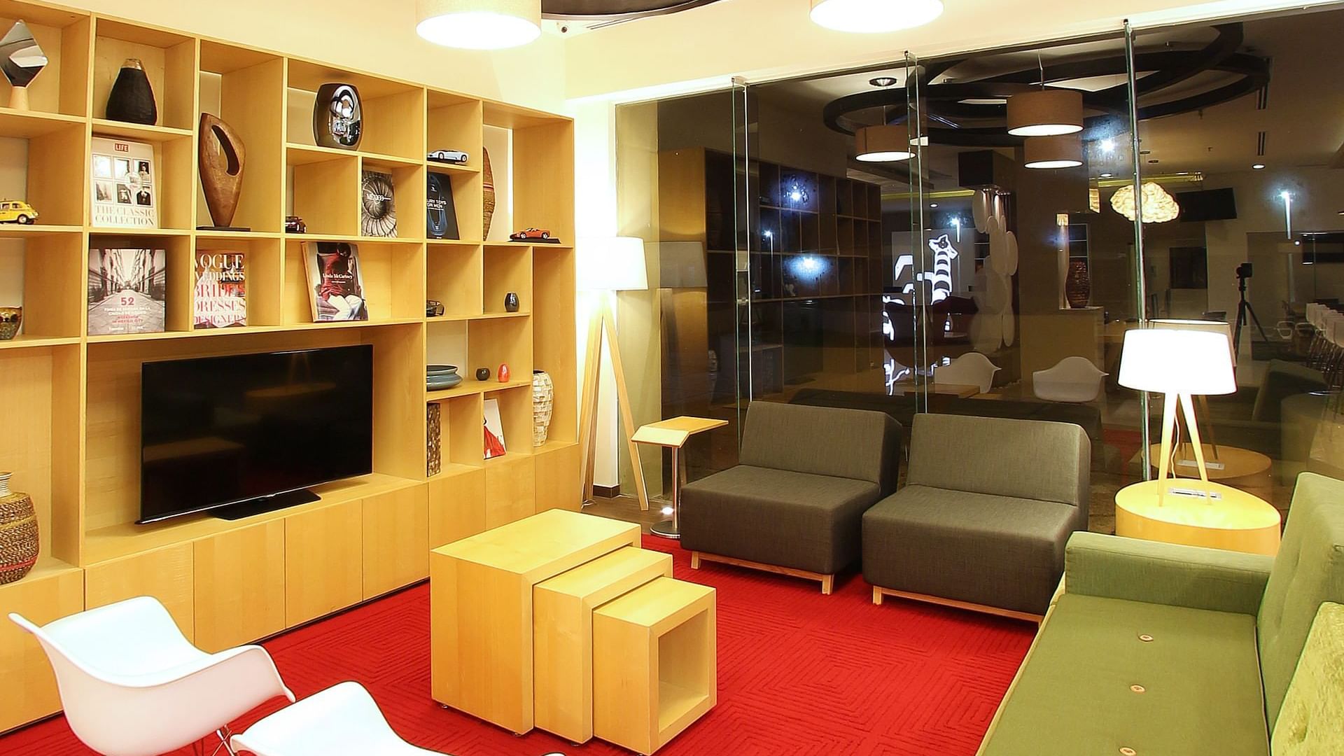 TV & a sofa set in the lounge area at Fiesta Inn Coatzacoalcos