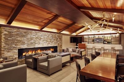 Loungers & dining tables in the bar at The Nest Palo Alto