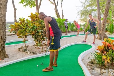 Two players playing golf at Holiday Inn Montego Bay