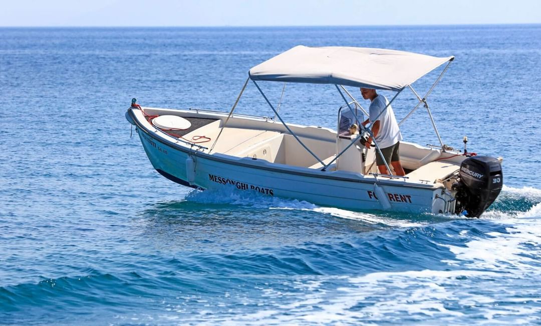 Close up on a boat in beach at Kairaba Hotel