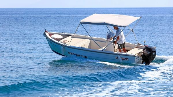 Close up on a boat in beach at Kairaba Hotel