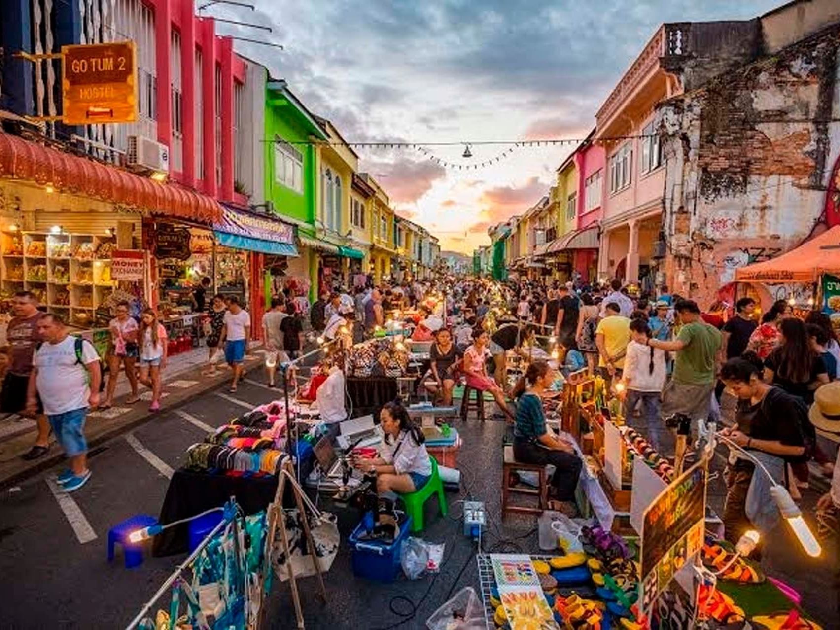 Busy crowd in the market street near Paradox Phuket Resort