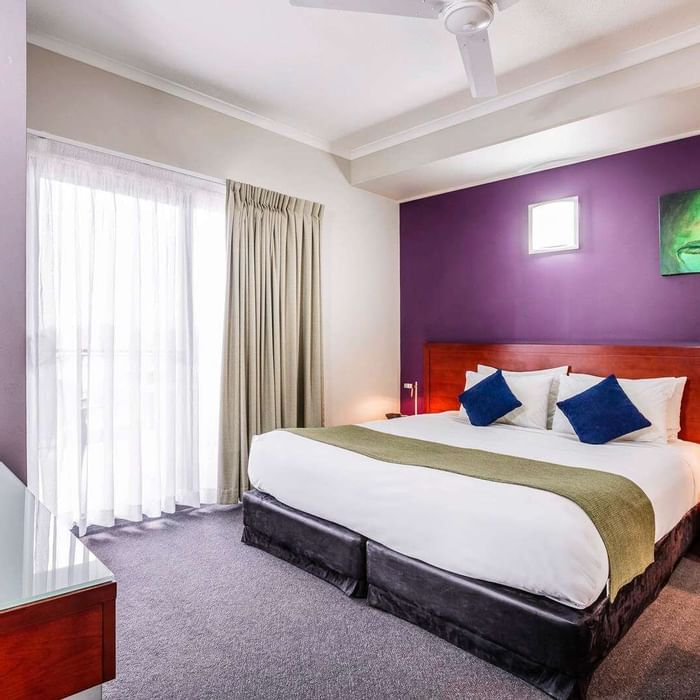 Two Bedroom Suite with a TV at Novotel Darwin Airport