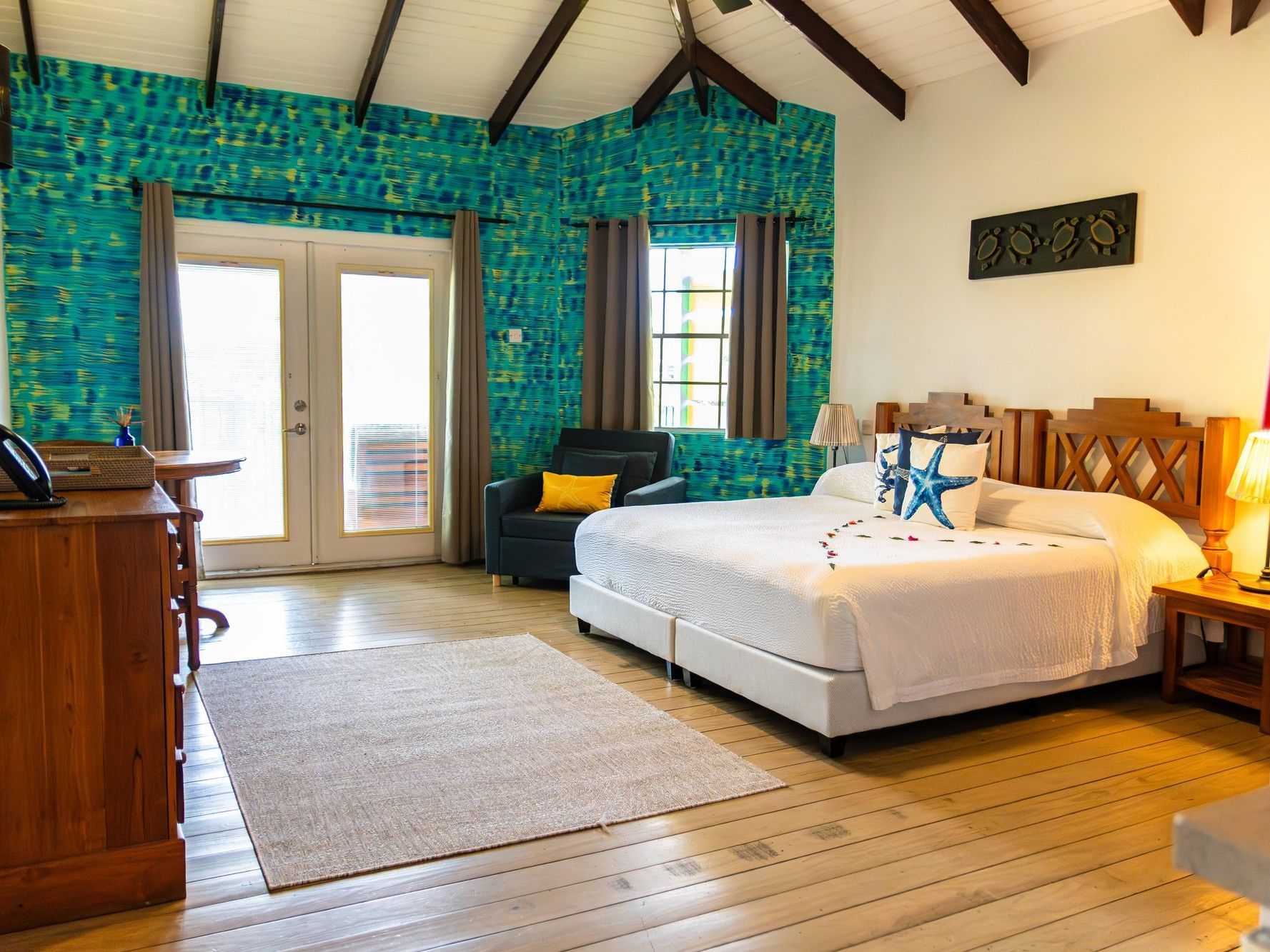 Canopy bed & chair in True Blue Room at True Blue Bay Resort