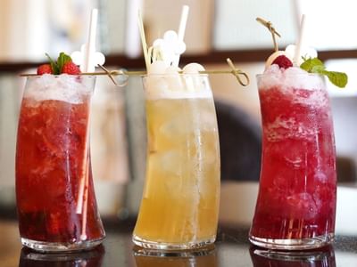 Close-up of tropical cocktails served at Hanoi Daewoo Hotel