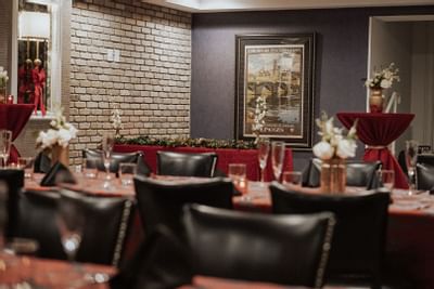 banquet room with red table cloth