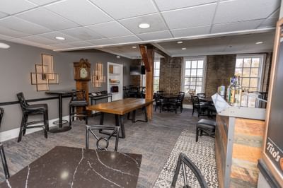 Table set-up with carpeted floors in Savannah Meeting Spaces at River Street Inn