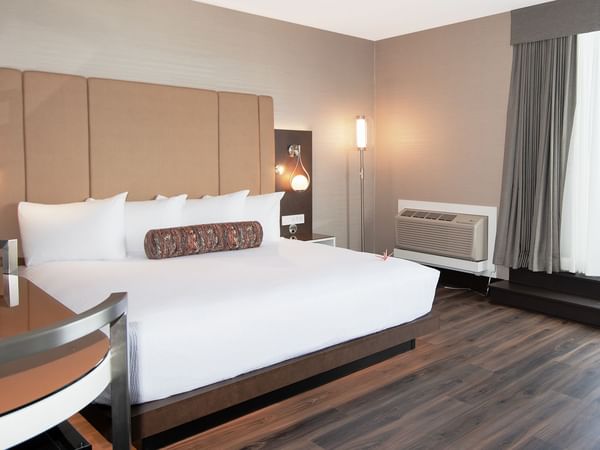 Hotel guestroom with a king size bed