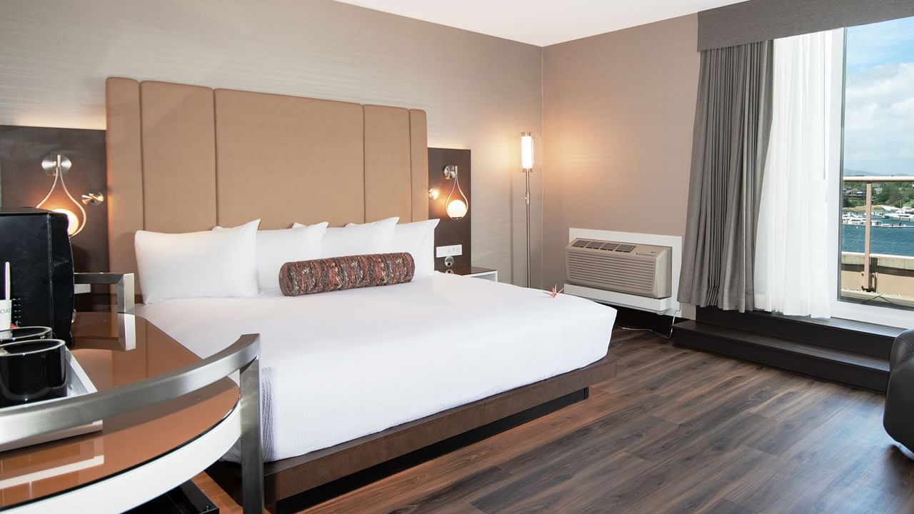 Hotel guestroom with a king size bed