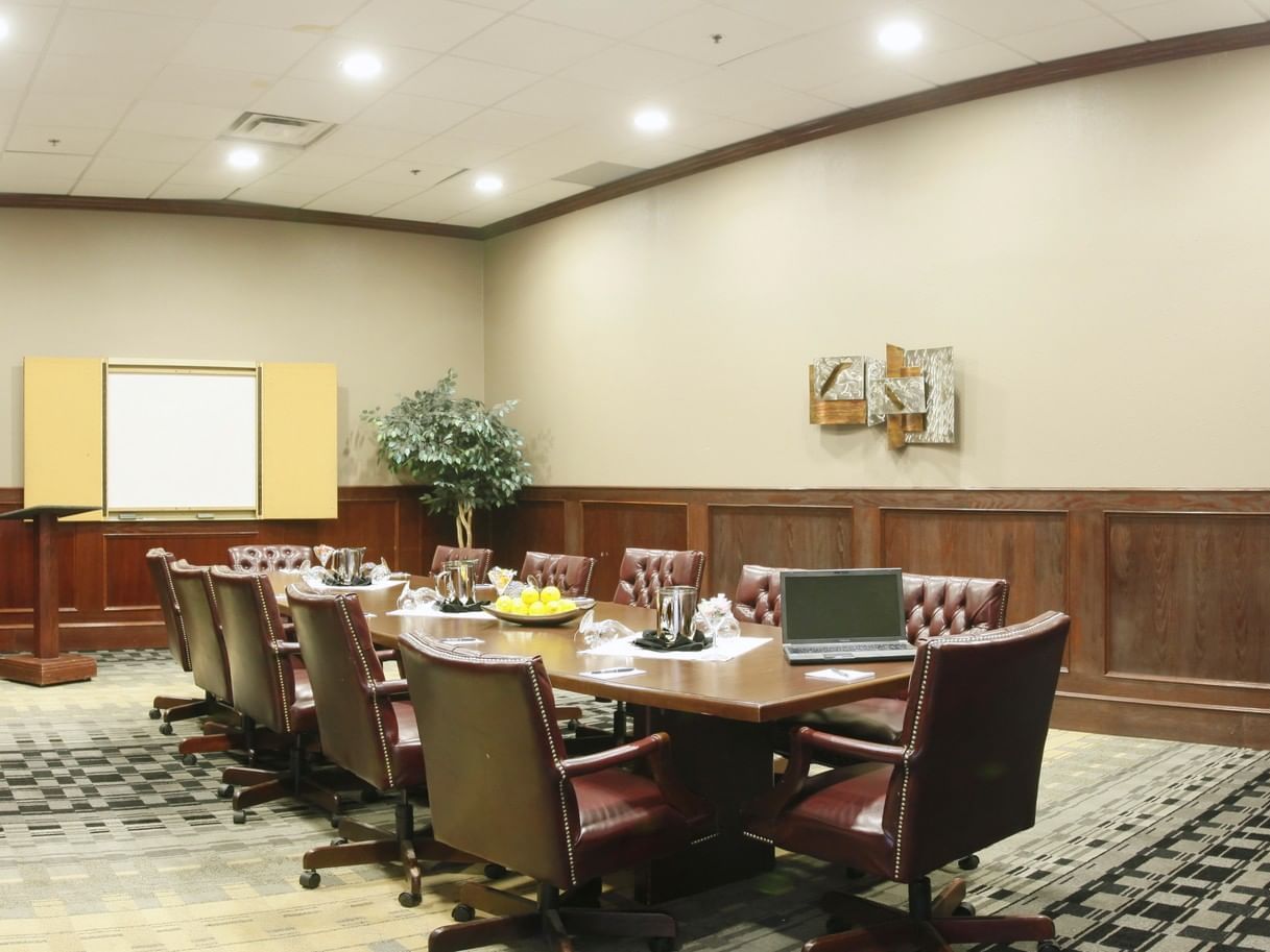 a large conference table in a boardroom
