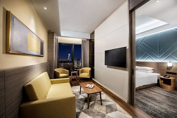 Family Suite Living Room showcasing TV with couch at Sunway Hotel Big Box