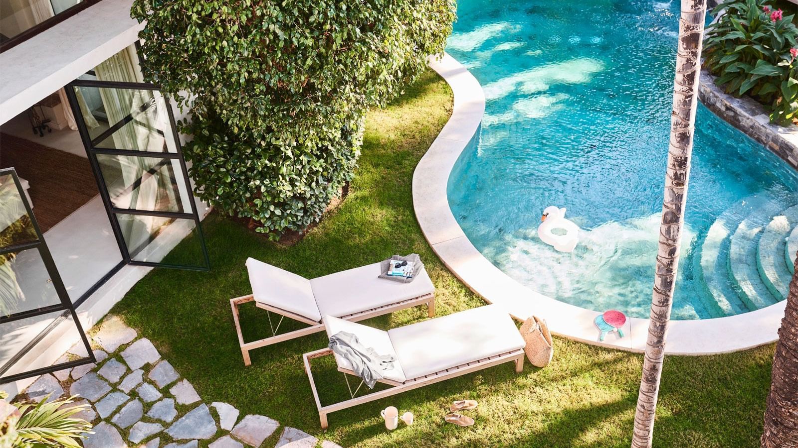 Sunbeds by the outdoor pool in Bel Air at Marbella Club