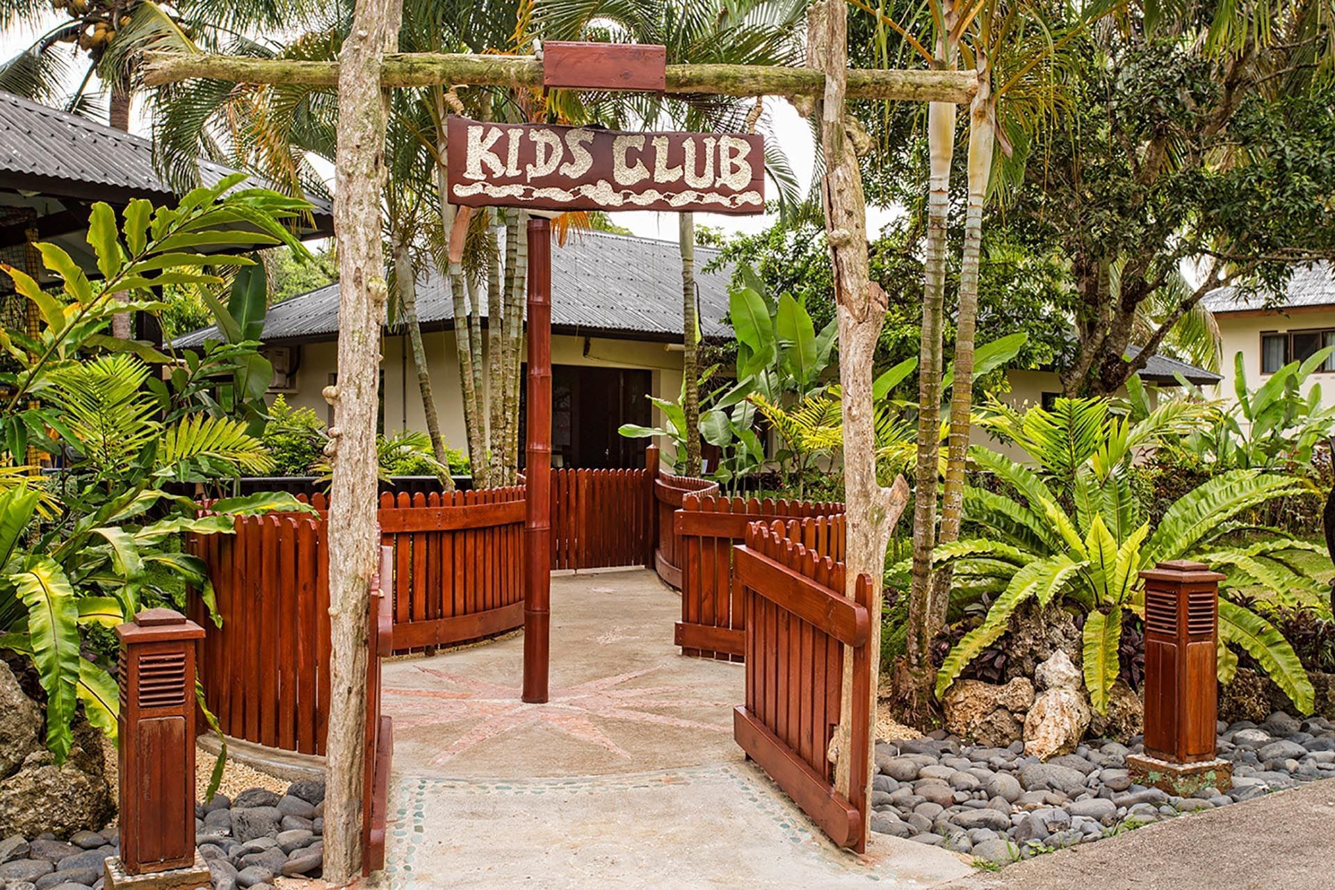 Entrance with a sign of Kids Club at Warwick Le Lagon 