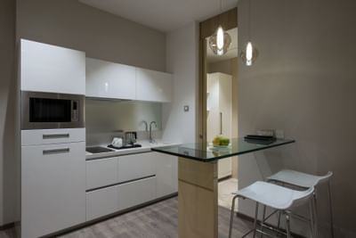 Kitchenette & dining area in Suites at Eastin Residences Vadodara