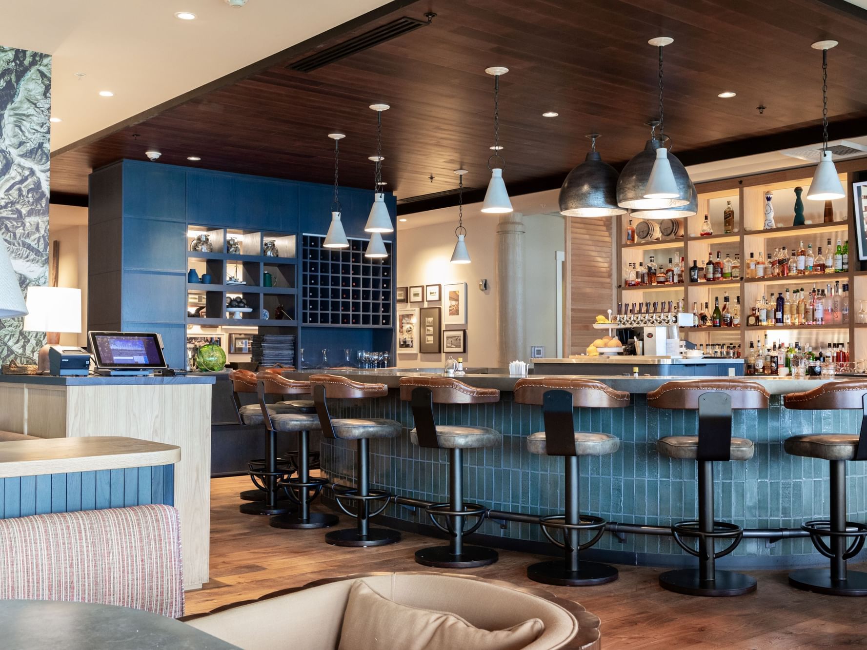 Lounge area by the bar counter in a restaurant at Alderbrook Resort & Spa