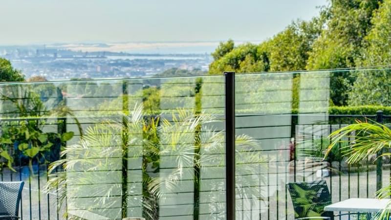 Breakfast served on a table outdoors overlooking the distant city view at Mercure Charlestown