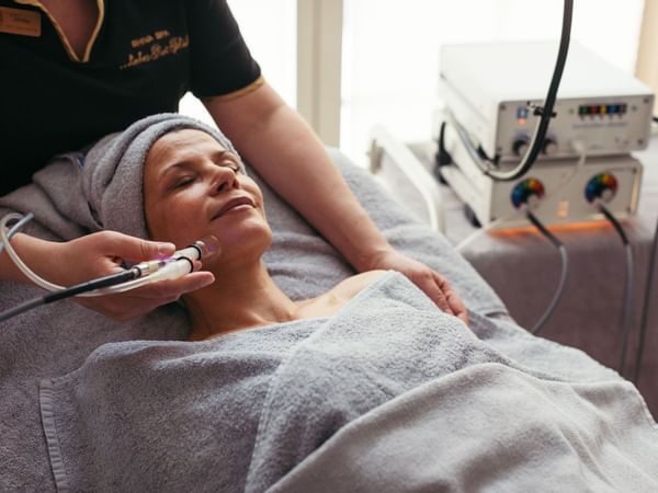 Lady receiving a skin treatment in Liebes Rot's Wellness Center