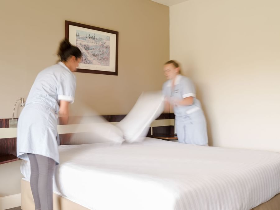The maids make the bed at Villa borghese