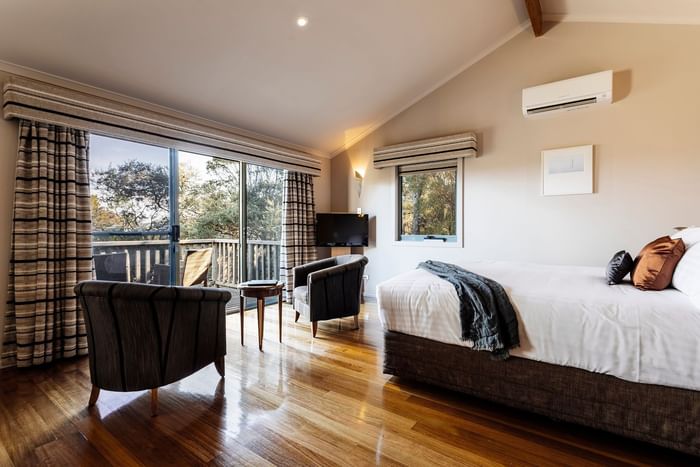 Premier Spa Cabin bedroom with king bed at Freycinet Lodge