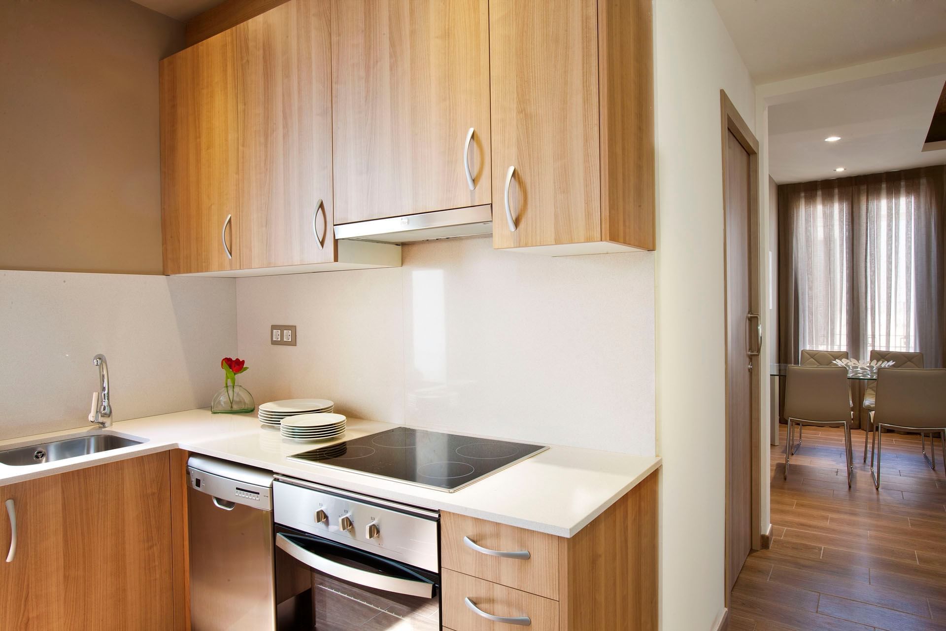 Kitchen area in Deluxe room at Barcelona Apartment