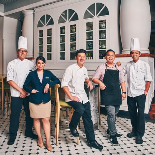 Chefs & female office staff posing at Paradox Singapore