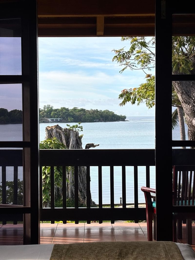 Lagoon View Room balcony with ocean view at Warwick Le Lagon - Vanuatu in Efate.