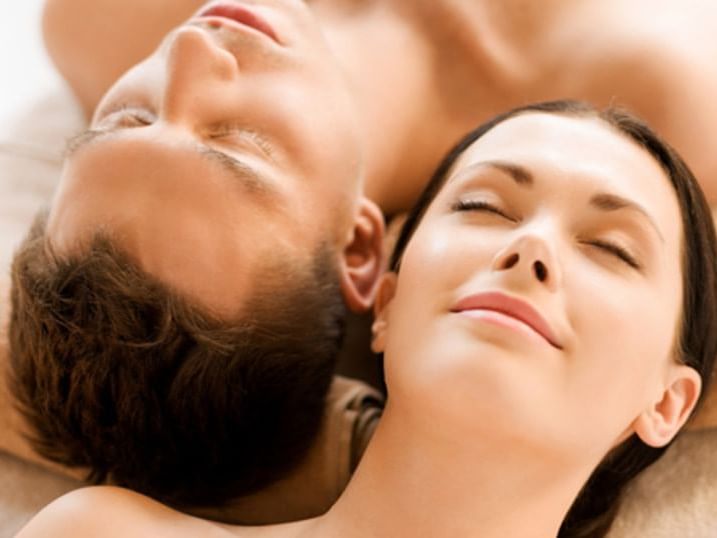 A couple relaxing in the spa at Ana Hotels Bradul Poiana Braşov